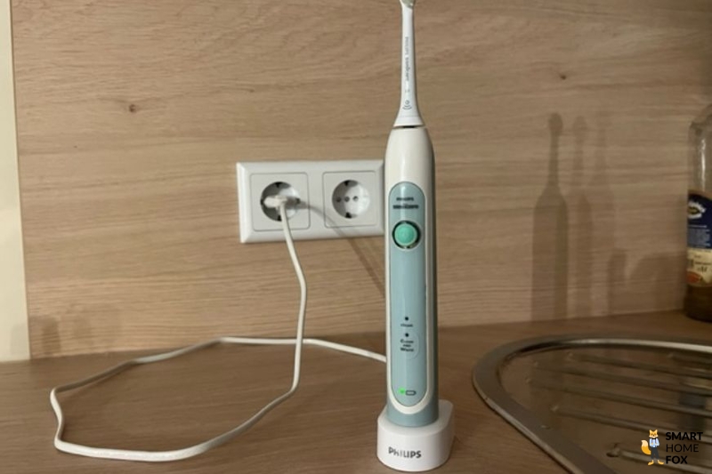 Electric toothbrush on charge.